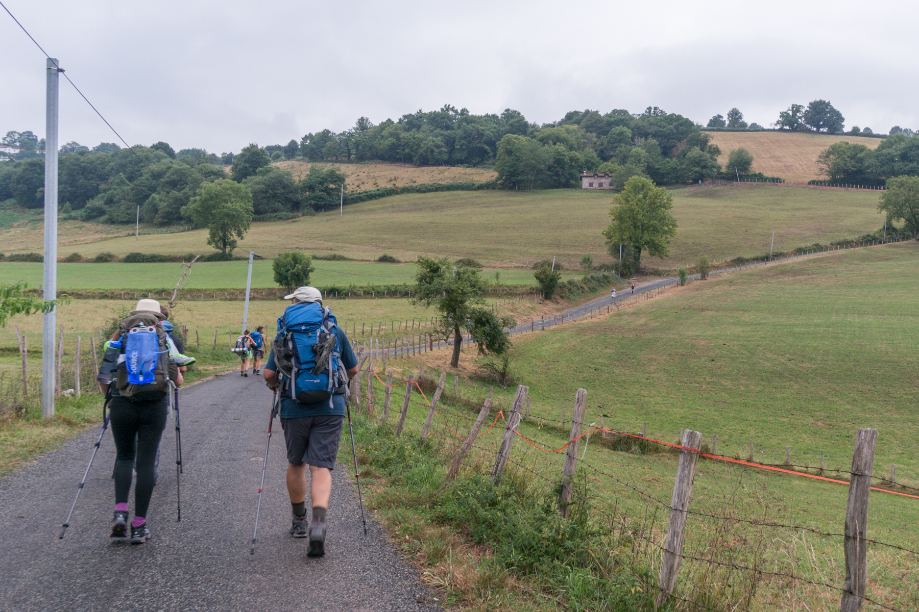 Camino pilgrims in French Pyrenee foothills | Photo by Mike Hudak