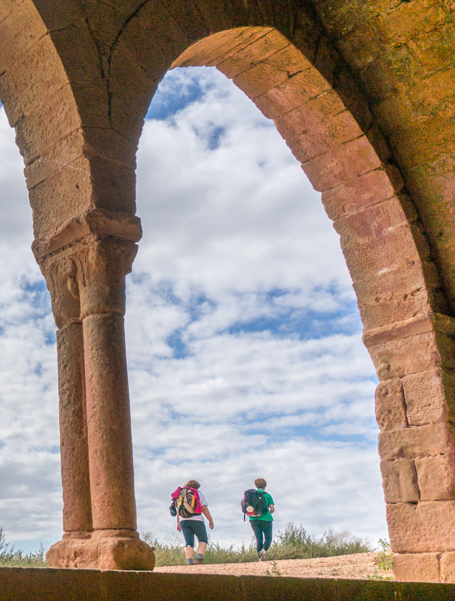 Camino pilgrims viewed from the Fuente de Los Moros east of Villamayor de Monjardín, Spain | Photo by Mike Hudak
