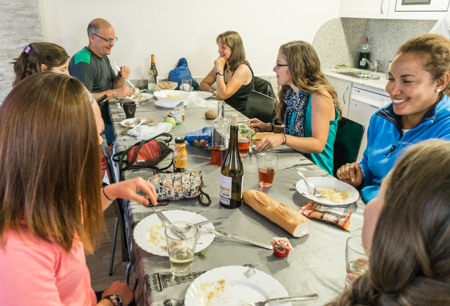 Camino pilgrims dine on self-prepared dinner at Albergue Villamayor de Monjardín, Spain | Photo by Mike Hudak