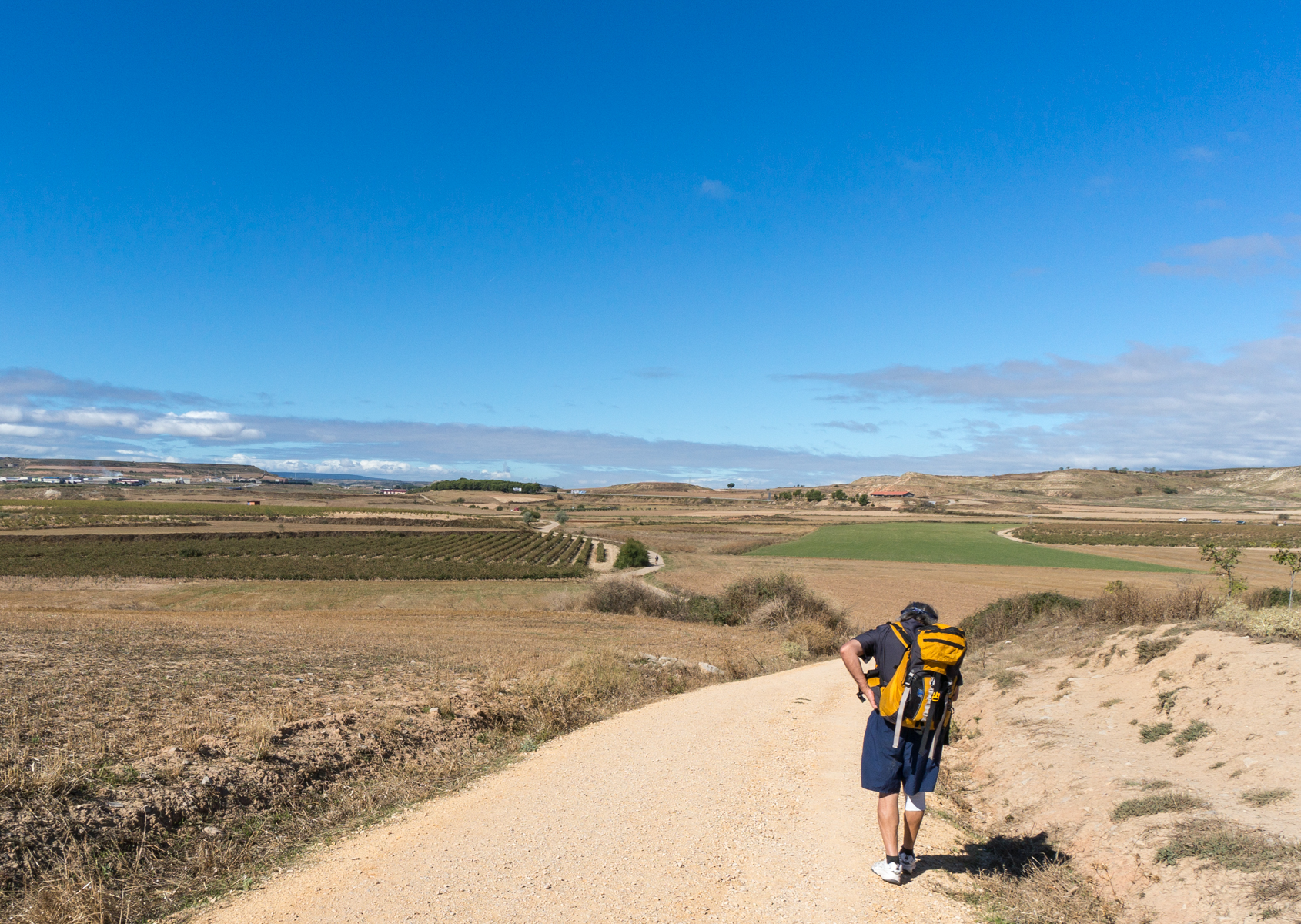 Pilgrim on the Camino Francés west of Viana, Spain | Photo by Mike Hudak