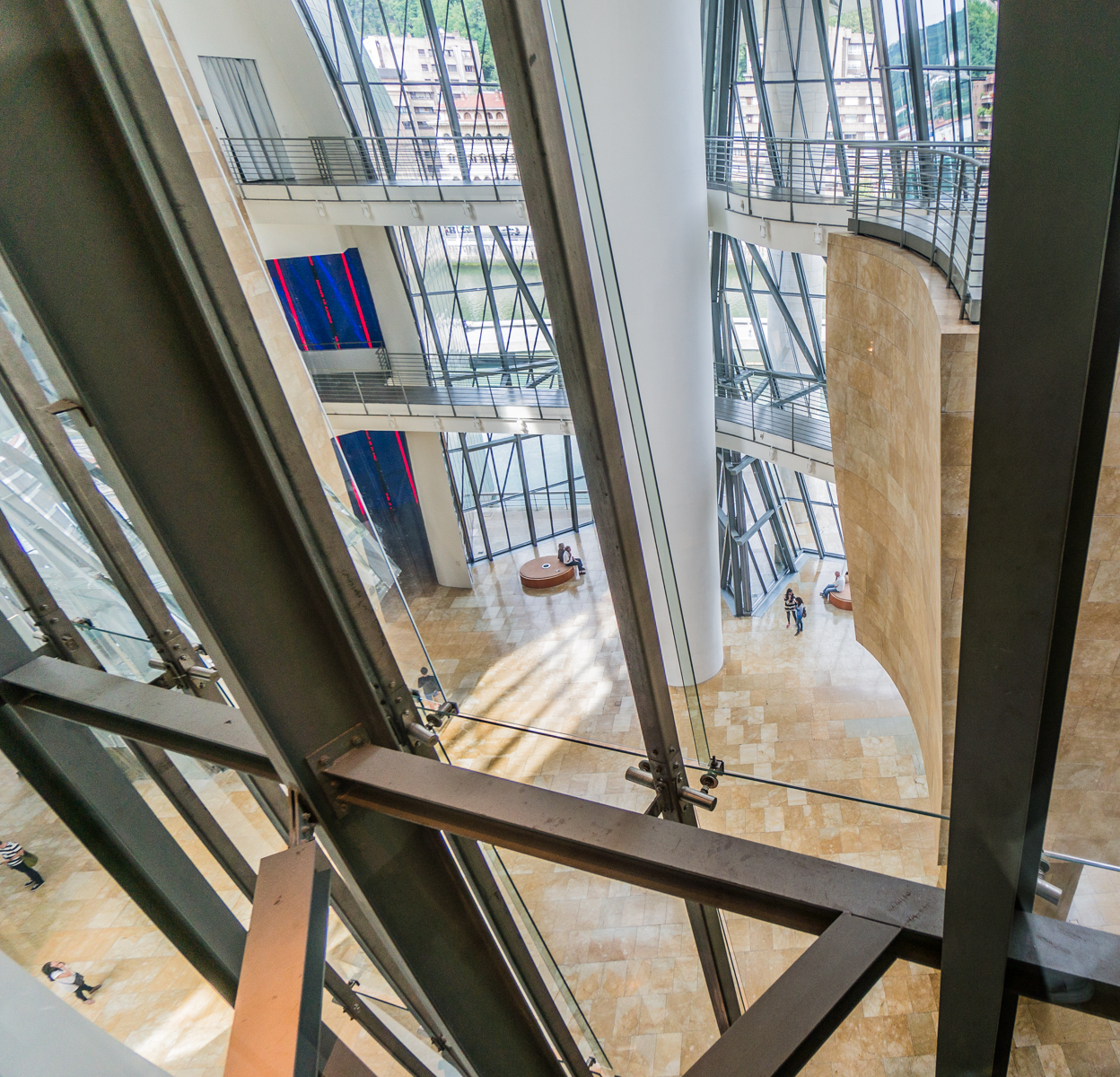 Lobby of Guggenheim Museum Bilbao viewed from one of the glass-walled elevators | Photo by Mike Hudak
