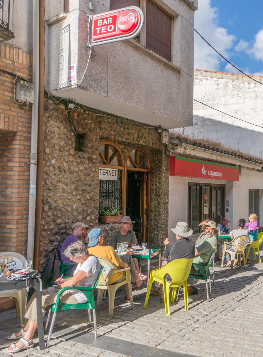 Camino Pilgrims at a bar/cafe on the Calle Mayor in Granon, Spain | Photo by Mike Hudak