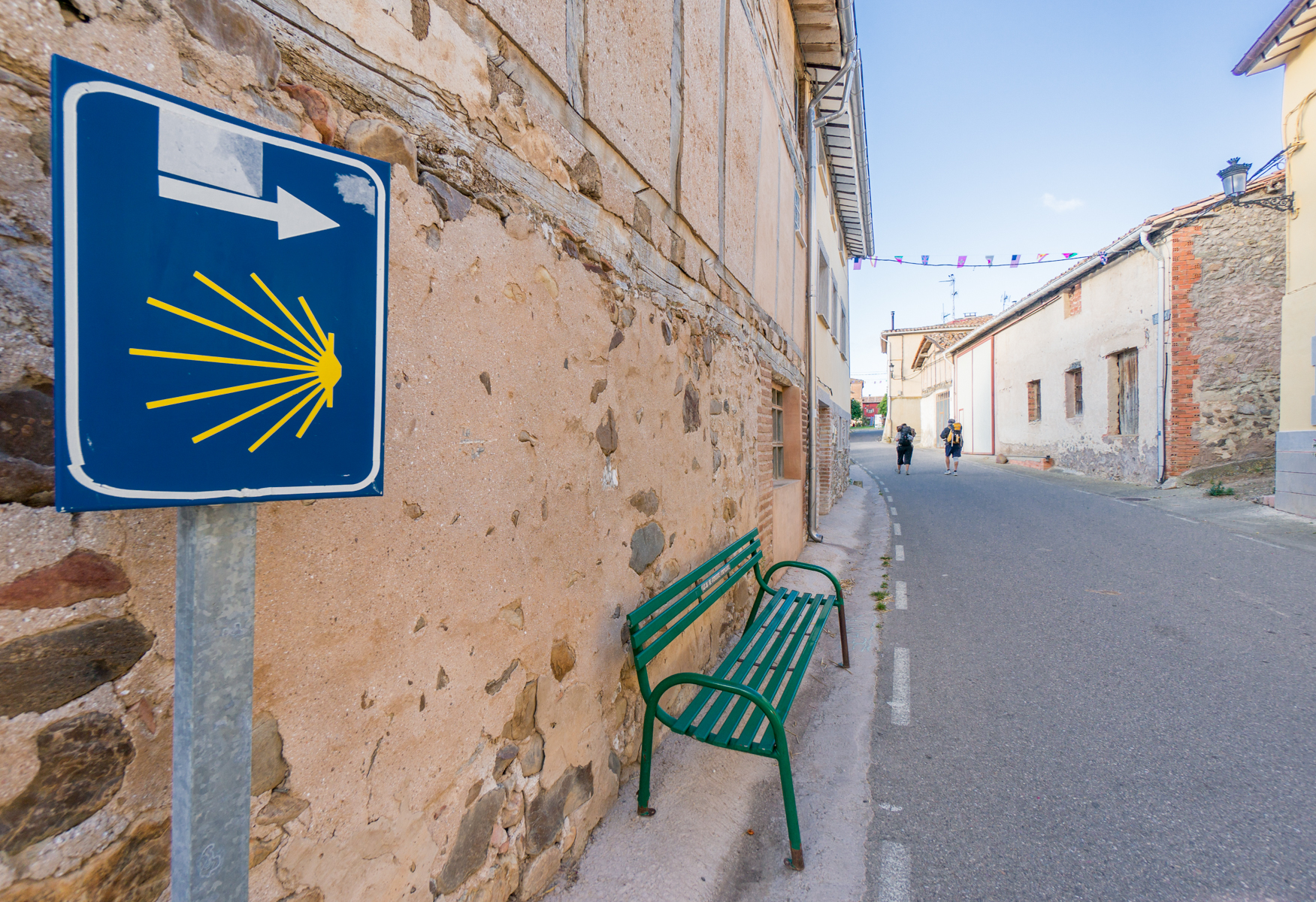 Camino pilgrims walk through Viloria de Rioja, Spain | Photo by Mike Hudak