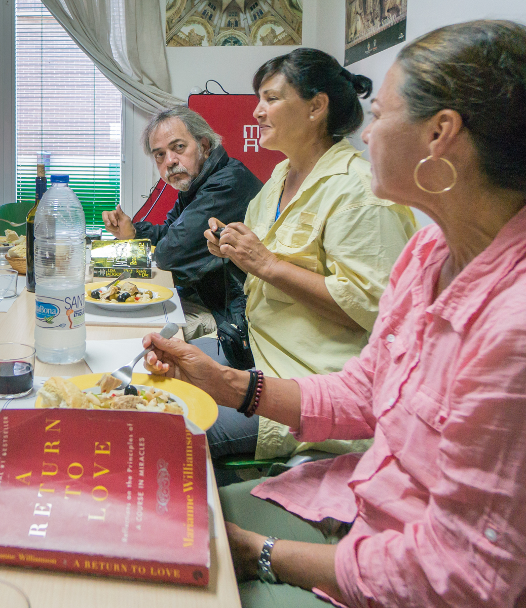 Communal dinner for pilgrims on the Camino Frances at Albergue San Roque, Villambistia, Spain | Photo by Mike Hudak