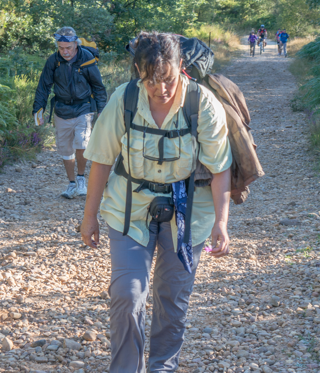 Weary Camino pilgrims west of Villafranca Montes de Oca, Spain | Photo by Mike Hudak