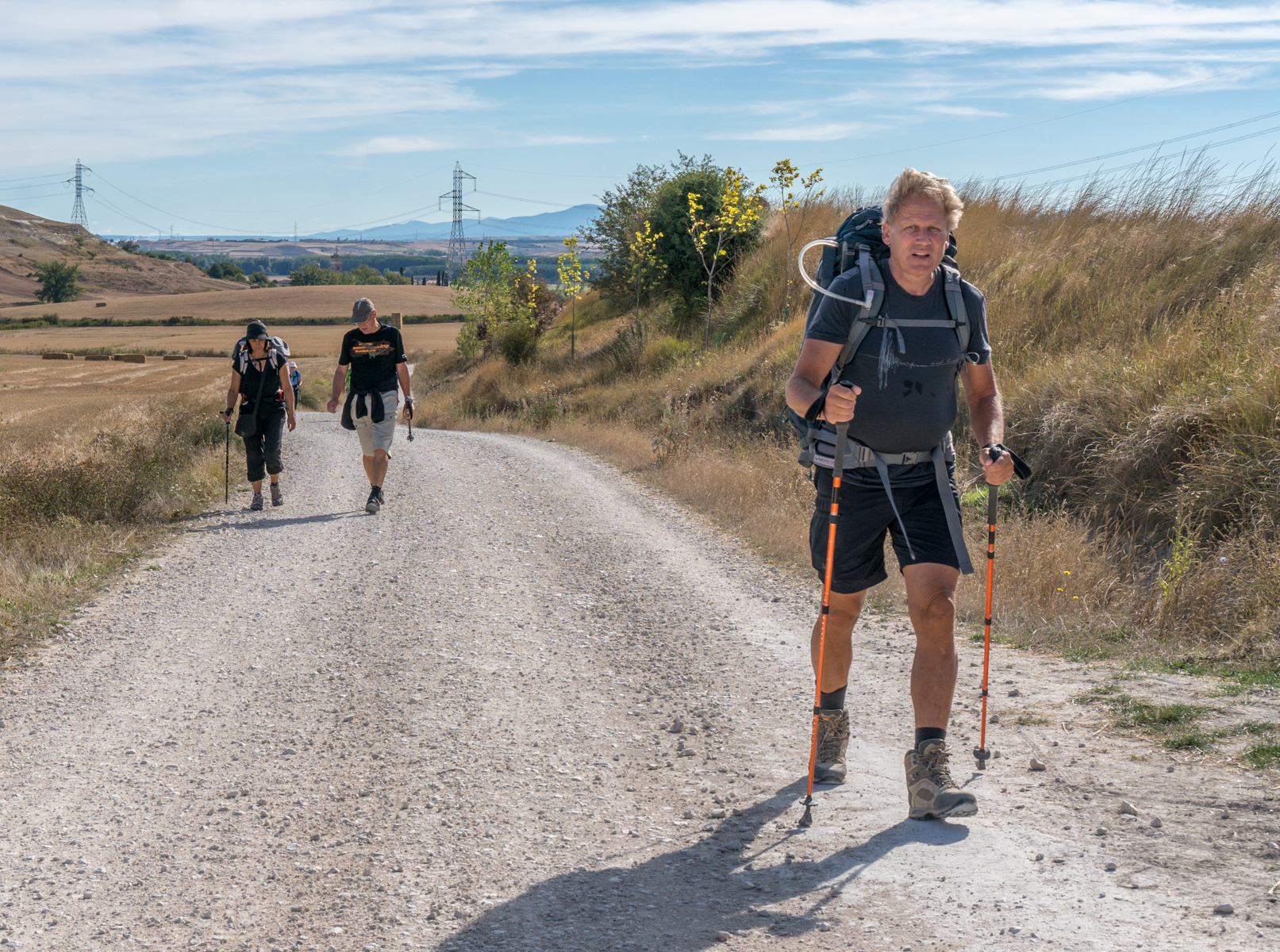 Camino pilgrims west of Rabe de las Calzados, Spain | Photo by Mike Hudak