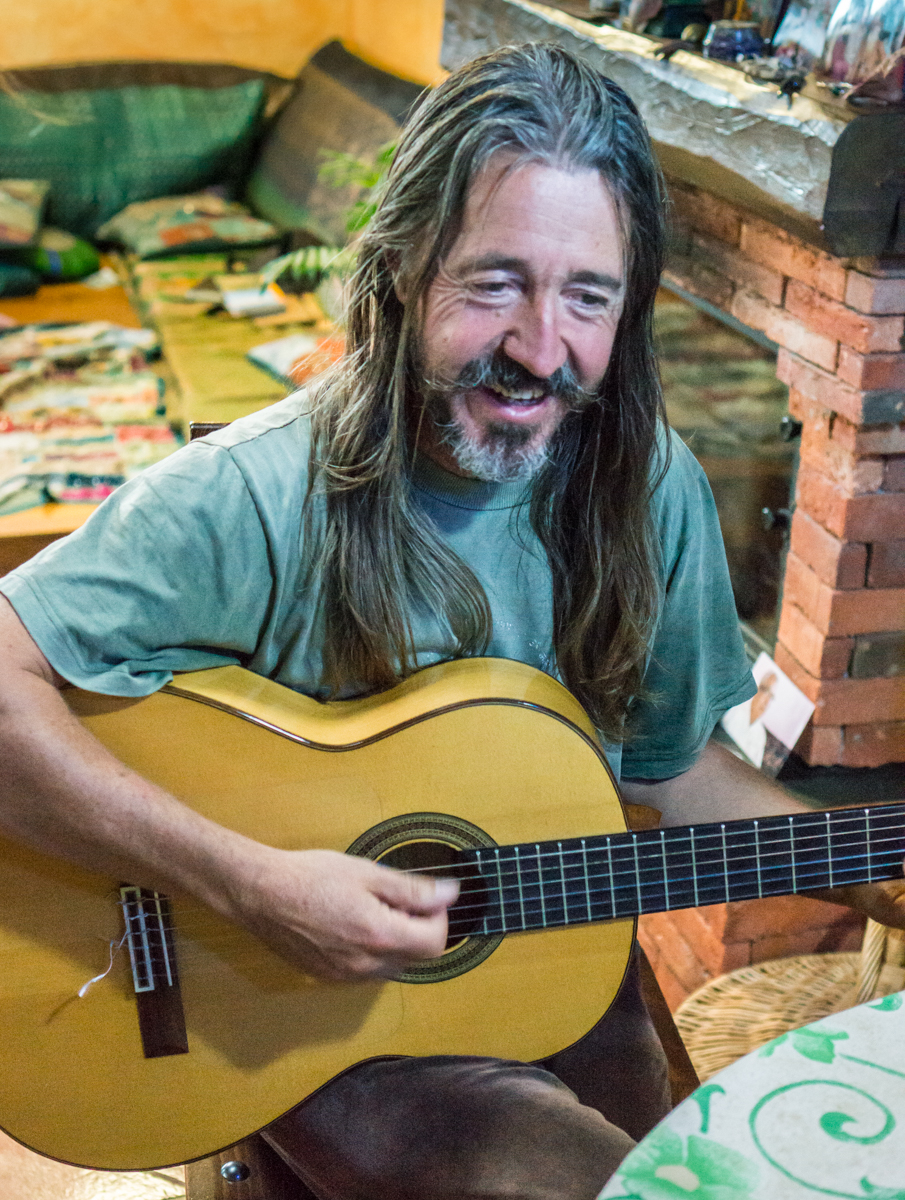 Hospitalero at Albergue Verde in Hospital de Órbigo entertains pilgrims before dinner | Photo by Mike Hudak