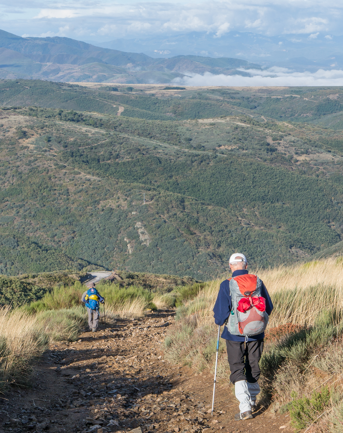 Pilgrims on a mountainous section of the Camino Francs approximately 7 km (4.3 miles) west of Manjarn | Photo by Mike Hudak
