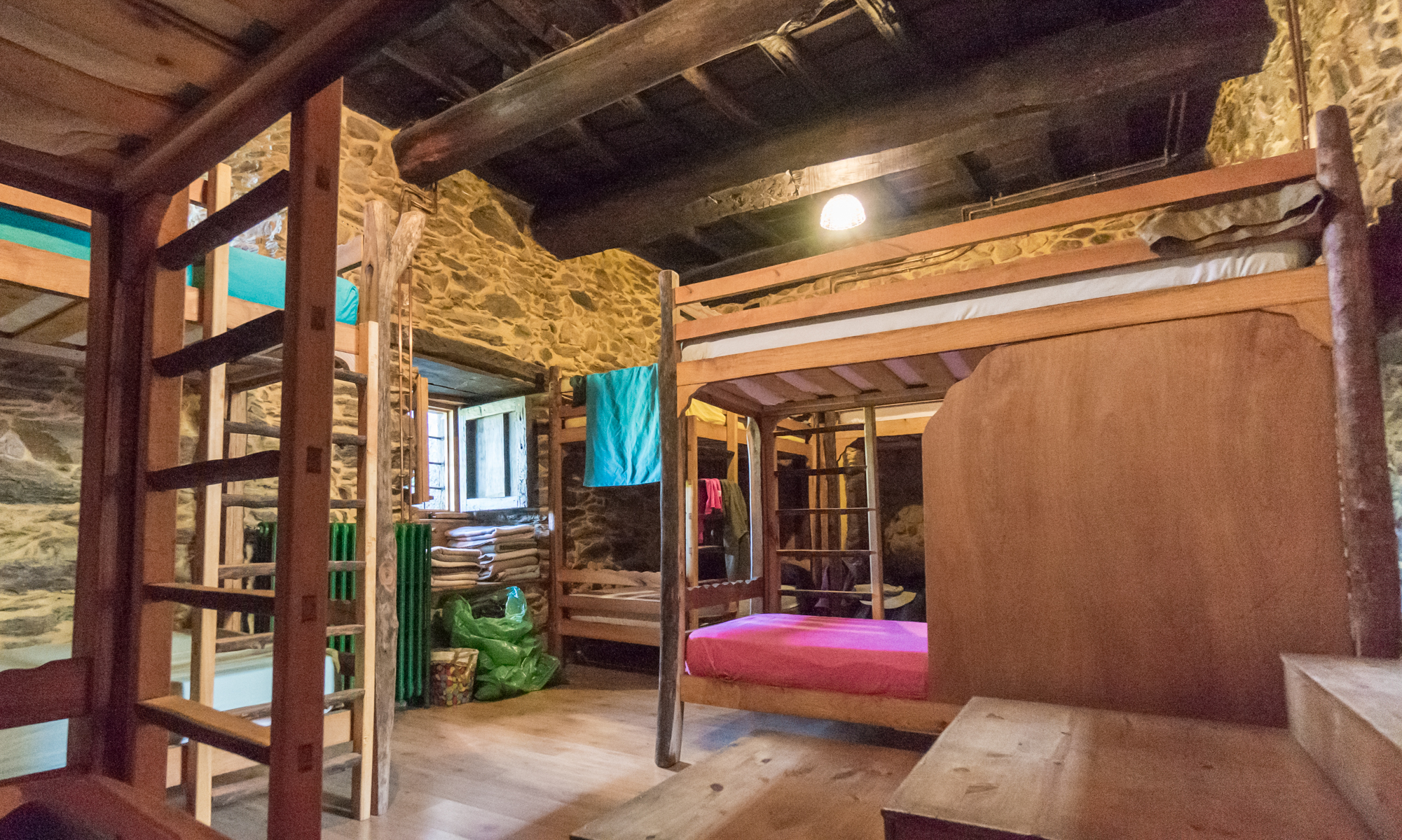 A dormitory at Albergue El Serbal y la Luna in Pieros, Spain | Photo by Mike Hudak