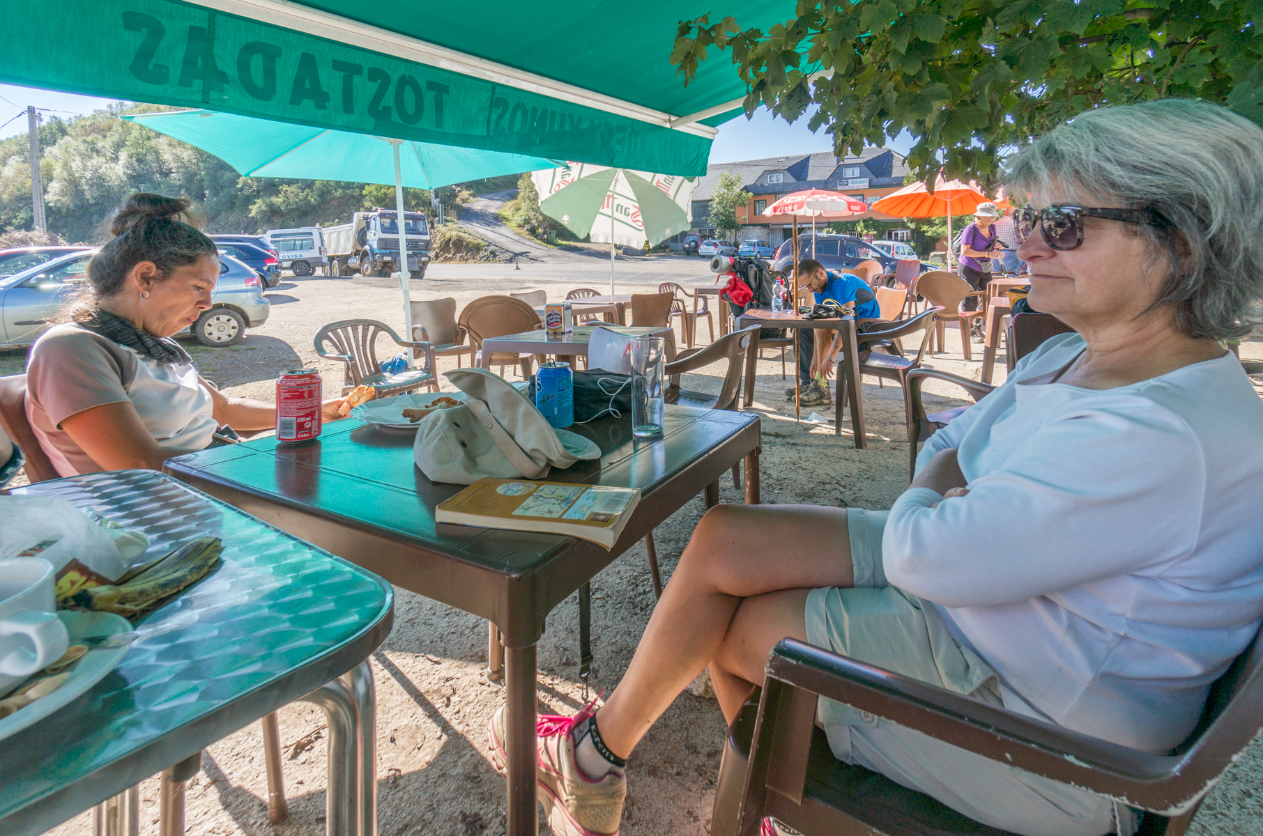 Two Canadian pilgrims at the caf of Albergue del Puerto (Alto do Poio, Spain) | Photo by Mike Hudak