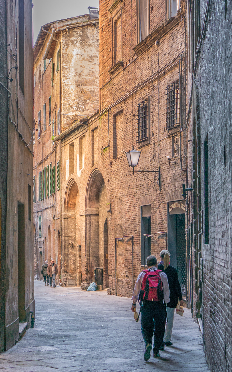 A Siena street leads to the Pinacoteca Nazionale (National Art Museum) (Italy) | Photo by Mike Hudak