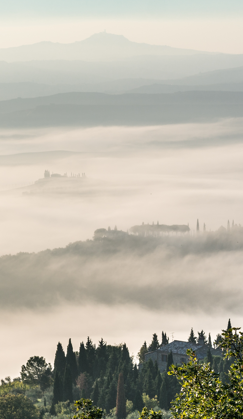 Cloud-shrouded vista along the Via Francigena approximately 3 km (1.9 miles) south of San Quirico d'Orcia on the way to the day's destination of Radicofani, Italy | Photo by Mike Hudak